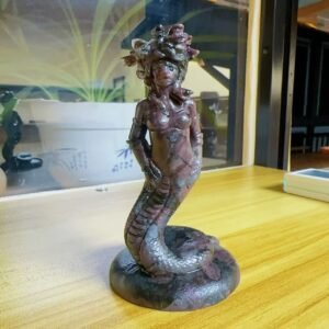 Medusa carved from natural garnet is exquisitely crafted and a new style is in vogue